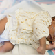 One of the sensors can be seen on the newborn’s right foot